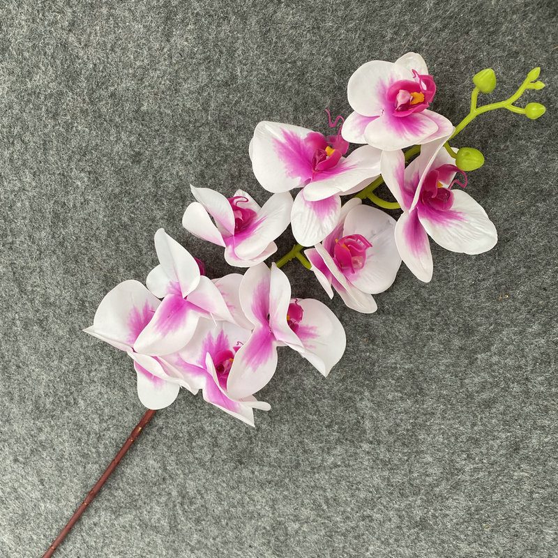 9 heads faux moth orchid is made of Film cloth and is available in 11 colors. Artificial orchids are mainly used for decoration and flower arrangement. Artificial orchids are common in home decoration and can be inserted in vases or pots to add vitality to living rooms, bedrooms and dining rooms. Orchids are beautiful and can mix with roses, hydrangeas, and lilies. Leafhometrade specializes in providing wholesale custom artificial plants.