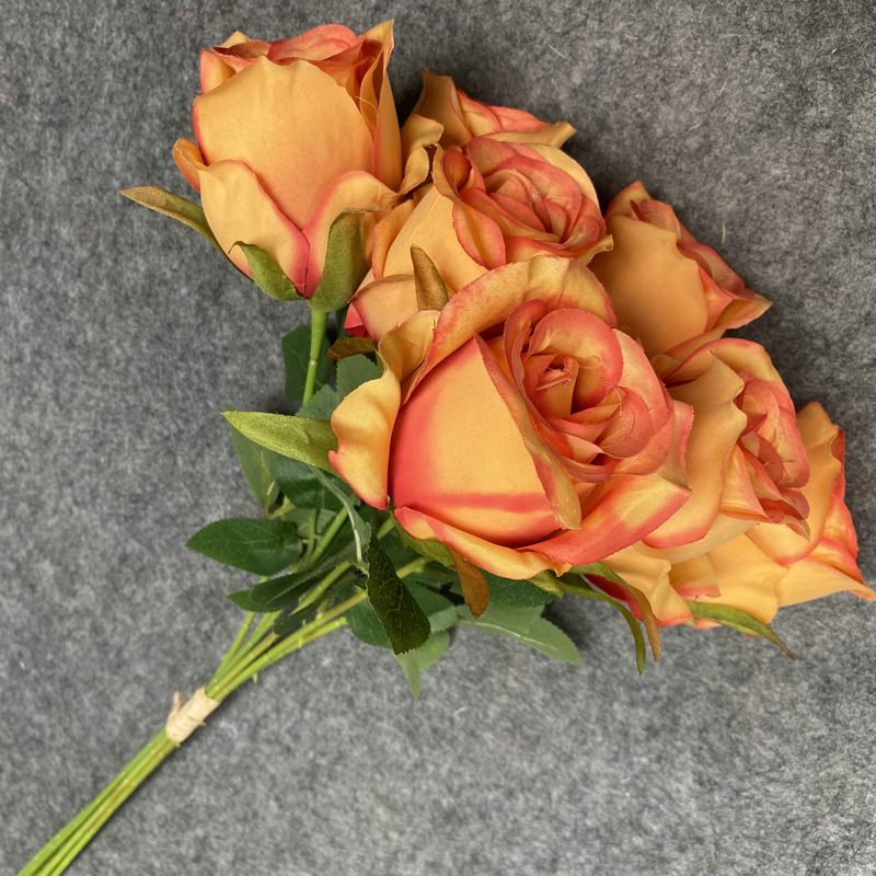 Fake flowers are Climbing Roses, made of fabric cloth, and are available in 12 colors. Rose artificial flowers are used for flower wall decor and wedding bouquets. Leafhometrade specializes in providing wholesale custom synthetic flowers.