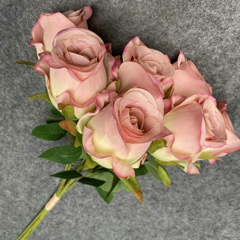 Fake flowers are Climbing Roses, made of fabric cloth, and are available in 12 colors. Rose artificial flowers are used for flower wall decor and wedding bouquets. Leafhometrade specializes in providing wholesale custom synthetic flowers.