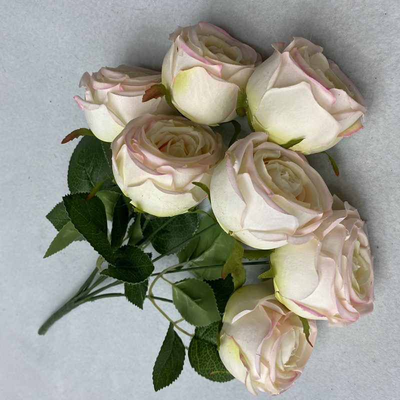 The Seven-Heads Rose Bouquet is a climbing rose made of fabric and available in 10 colors. Artificial roses are used for holiday parties and home decoration. Best match bouquets: delphinium, ball flower, milkweed, clematis, thistle, rose berry, terracotta rose, poet carnation, blueberry. Leafhometrade specializes in providing wholesale custom fake plants.