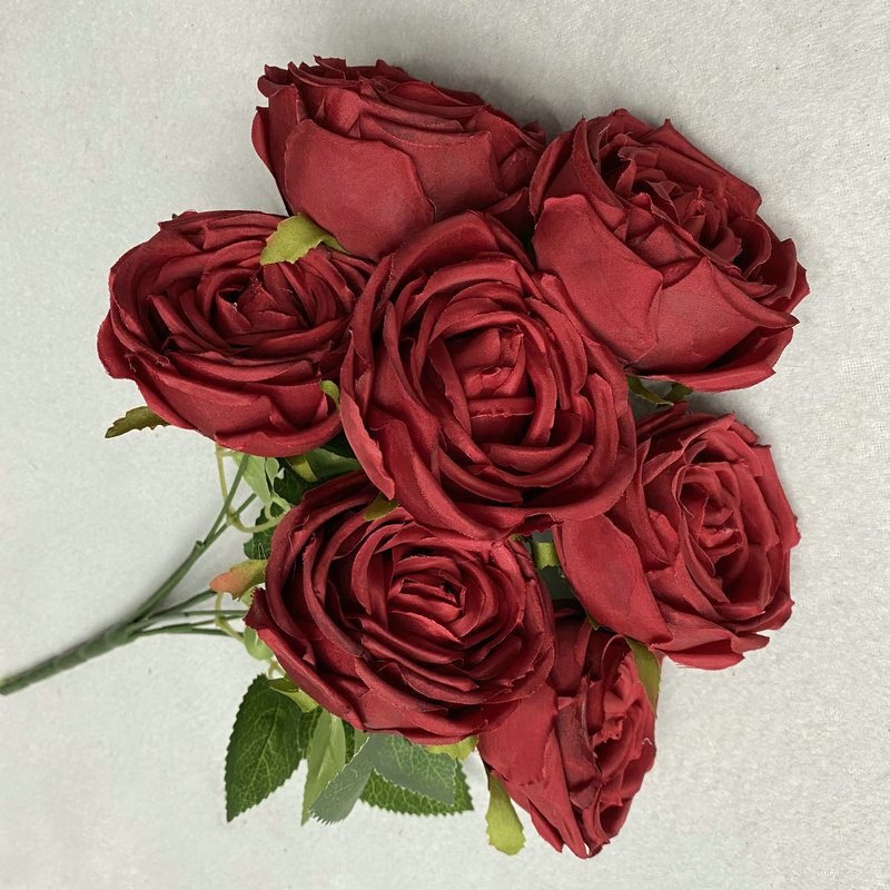 The Seven-Heads Rose Bouquet is a climbing rose made of fabric and available in 10 colors. Artificial roses are used for holiday parties and home decoration. Best match bouquets: delphinium, ball flower, milkweed, clematis, thistle, rose berry, terracotta rose, poet carnation, blueberry. Leafhometrade specializes in providing wholesale custom fake plants.