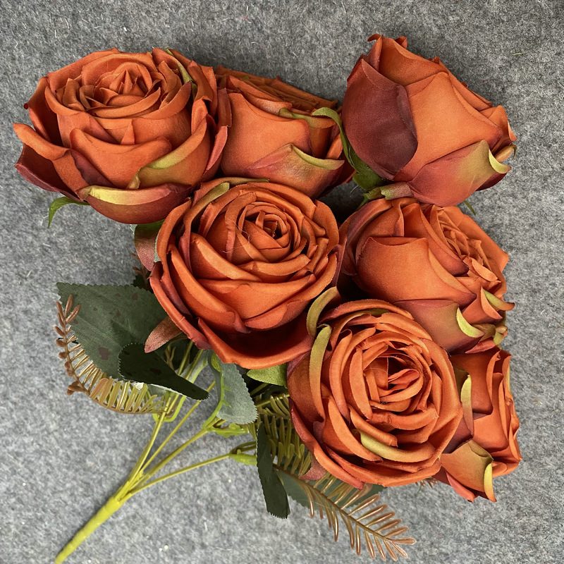 The seven-heads rose bouquet is a climbing rose made of fabric and available in 8 colors. Artificial roses are used for holiday parties and home decoration. Best match bouquets: delphinium, ball flower, milkweed, clematis, thistle, rose berry, terracotta rose, poet carnation, blueberry. Leafhometrade specializes in providing wholesale custom fake plants.