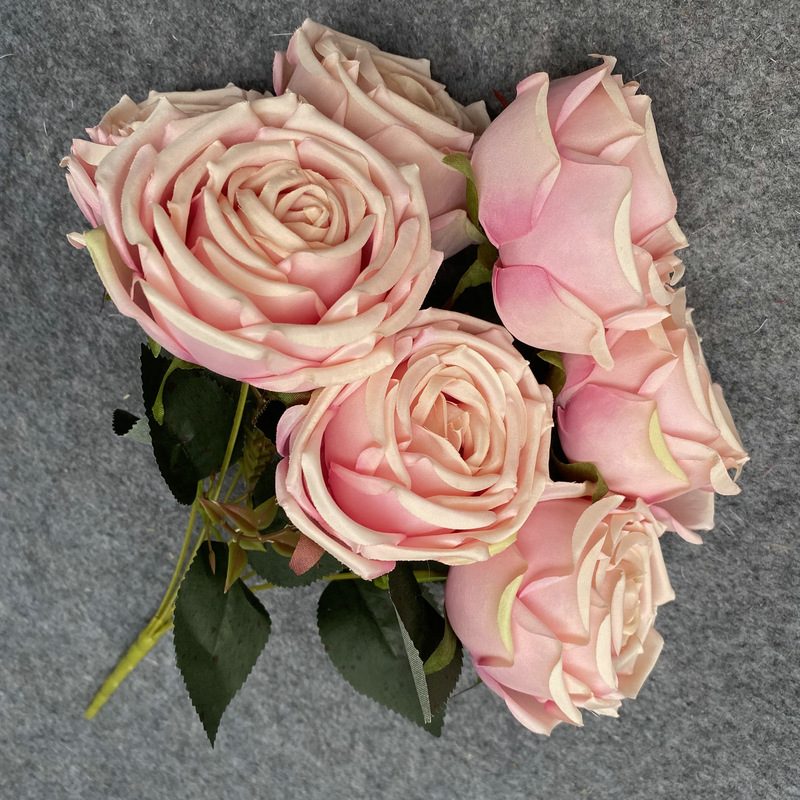 The seven-heads rose bouquet is a climbing rose made of fabric and available in 8 colors. Artificial roses are used for holiday parties and home decoration. Best match bouquets: delphinium, ball flower, milkweed, clematis, thistle, rose berry, terracotta rose, poet carnation, blueberry. Leafhometrade specializes in providing wholesale custom fake plants.