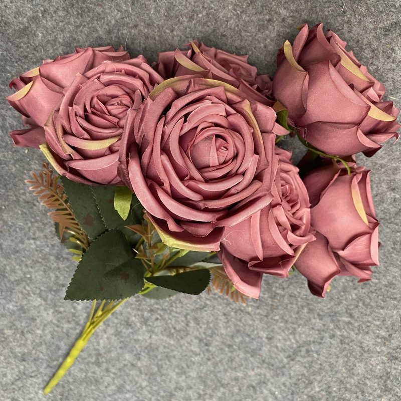 The seven-heads rose bouquet is a climbing rose made of fabric and available in 8 colors. Artificial roses are used for holiday parties and home decoration. Best match bouquets: delphinium, ball flower, milkweed, clematis, thistle, rose berry, terracotta rose, poet carnation, blueberry. Leafhometrade specializes in providing wholesale custom fake plants.