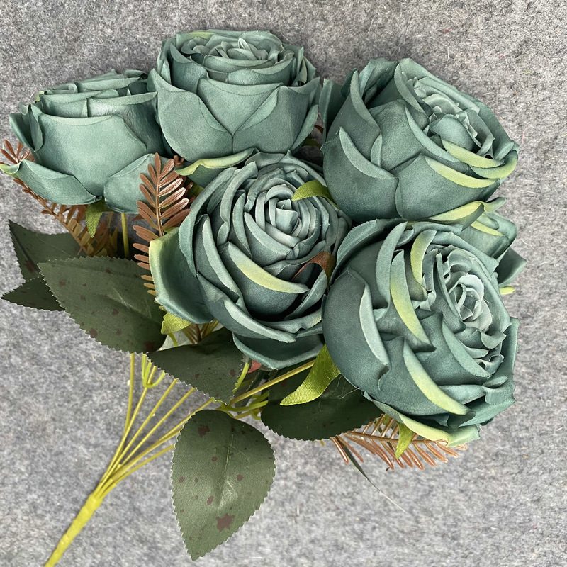 The seven-heads rose bouquet is a climbing rose made of fabric and available in 8 colors. Artificial roses are used for holiday parties and home decoration. Best match bouquets: delphinium, ball flower, milkweed, clematis, thistle, rose berry, terracotta rose, poet carnation, blueberry. Leafhometrade specializes in providing wholesale custom fake plants.