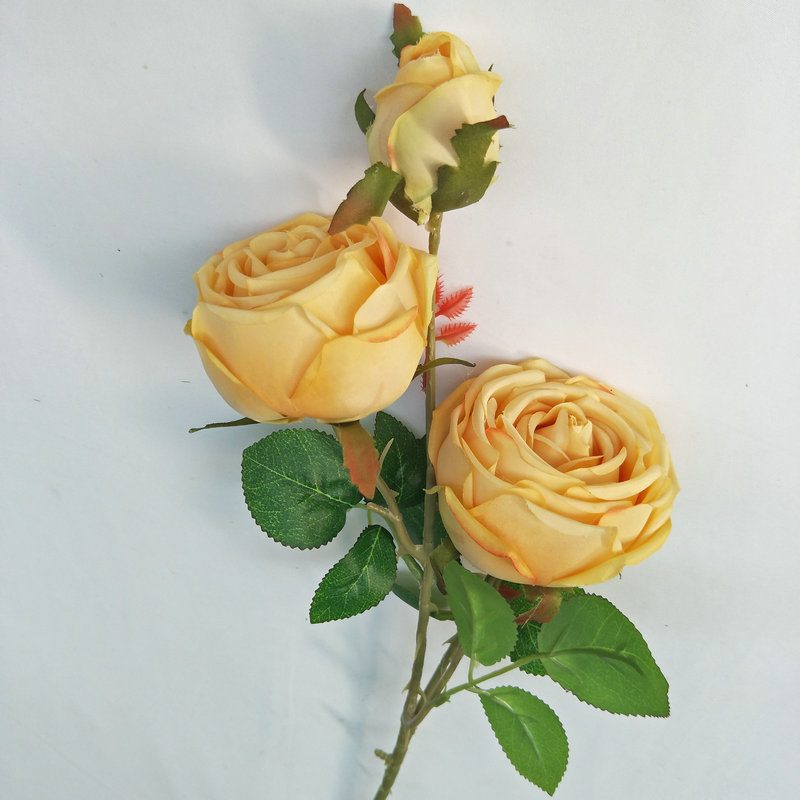 The three-heads rose bouquet is a climbing rose made of silk cloth and available in 8 colors. Artificial roses are used for holiday parties and home decoration. Best match bouquets: delphinium, ball flower, milkweed, clematis, thistle, rose berry, terracotta rose, poet carnation, blueberry. Leafhometrade specializes in providing wholesale custom fake plants.