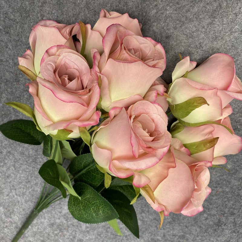 The artificial flowers are Climbing Rose made from 240 brushed fabric and are available in 12 colors. Artificial rose flowers are used for home decoration and wedding flower arrangements. Leafhometrade specializes in providing wholesale custom floral artificial flowers.