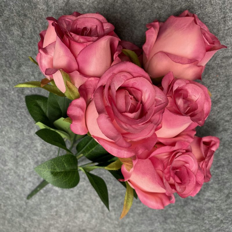 The artificial flowers are Climbing Rose made from 240 brushed fabric and are available in 12 colors. Artificial rose flowers are used for home decoration and wedding flower arrangements. Leafhometrade specializes in providing wholesale custom floral artificial flowers.