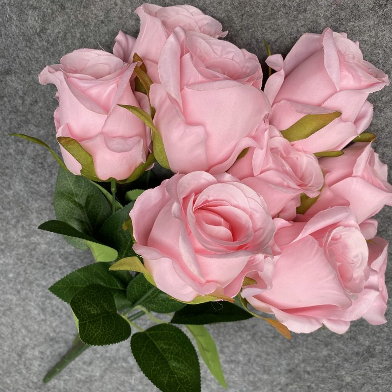 The artificial flowers are Climbing Rose made from 240 brushed fabric and are available in 12 colors. Artificial rose flowers are used for home decoration and wedding flower arrangements. Leafhometrade specializes in providing wholesale custom floral artificial flowers.