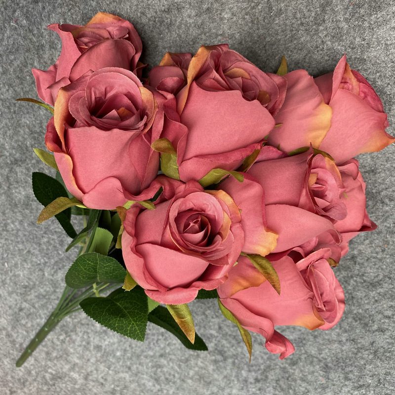 The artificial flowers are Climbing Rose made from 240 brushed fabric and are available in 12 colors. Artificial rose flowers are used for home decoration and wedding flower arrangements. Leafhometrade specializes in providing wholesale custom floral artificial flowers.