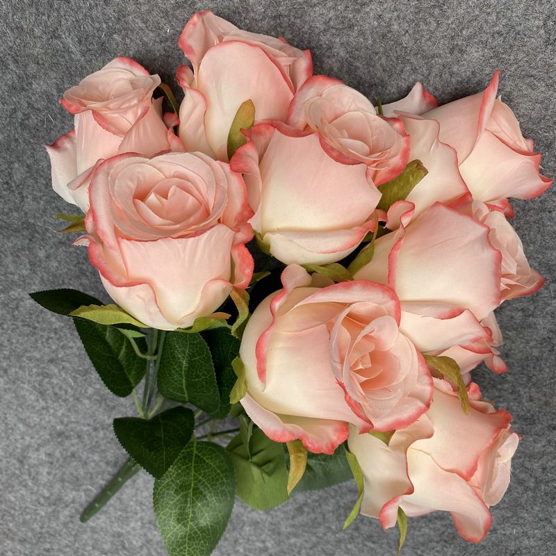 The artificial flowers are Climbing Rose made from 240 brushed fabric and are available in 12 colors. Artificial rose flowers are used for home decoration and wedding flower arrangements. Leafhometrade specializes in providing wholesale custom floral artificial flowers.