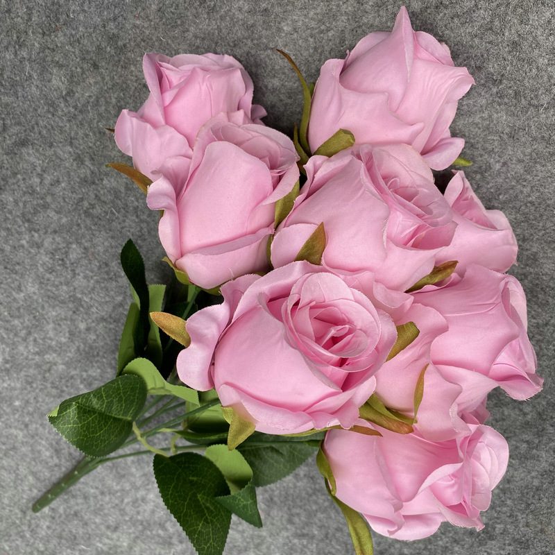 The artificial flowers are Climbing Rose made from 240 brushed fabric and are available in 12 colors. Artificial rose flowers are used for home decoration and wedding flower arrangements. Leafhometrade specializes in providing wholesale custom floral artificial flowers.