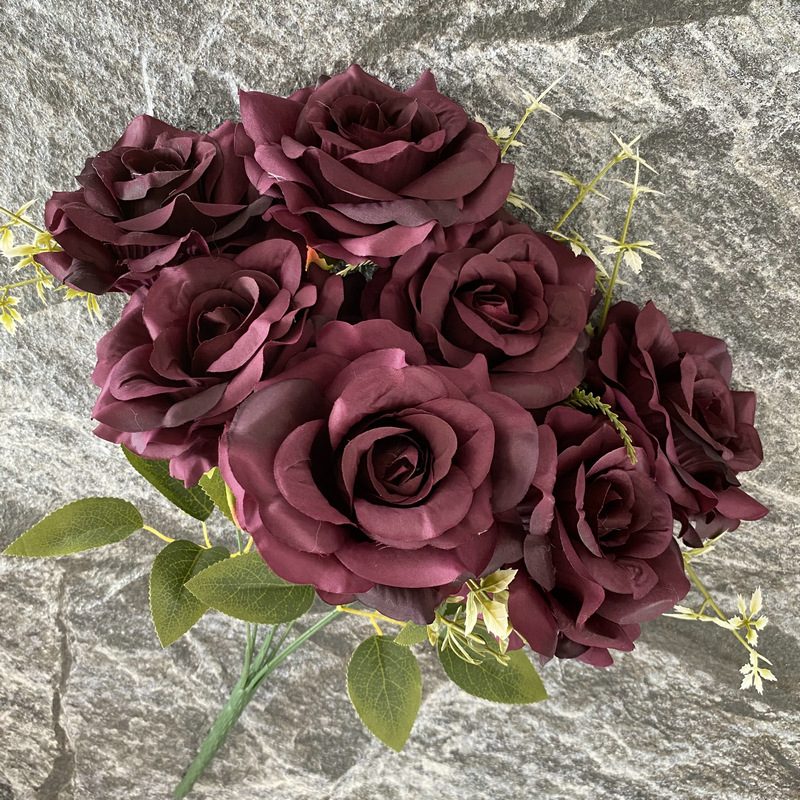 Artificial floral arrangements are Floribunda Roses, made of 240 woolen cloth, and available in 25 colors. Artificial rose flowers are used for wedding decoration and party decoration. Leafhometrade specializes in providing wholesale custom artificial flowers.