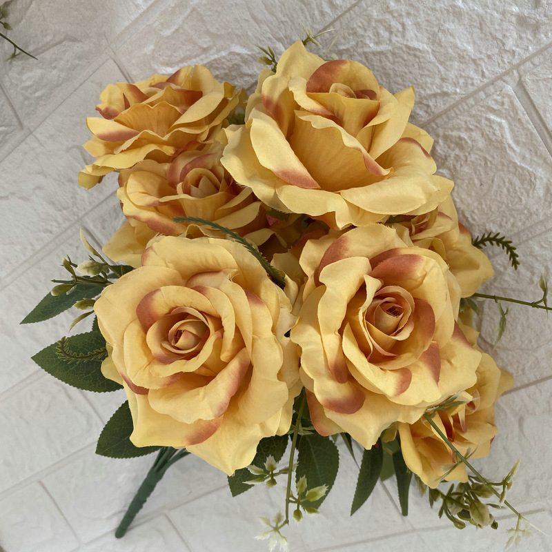 Artificial floral arrangements are Floribunda Roses, made of 240 woolen cloth, and available in 25 colors. Artificial rose flowers are used for wedding decoration and party decoration. Leafhometrade specializes in providing wholesale custom artificial flowers.