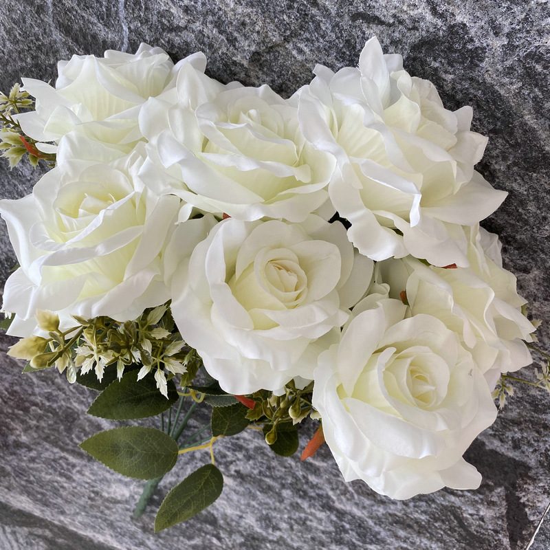 Artificial floral arrangements are Floribunda Roses, made of 240 woolen cloth, and available in 25 colors. Artificial rose flowers are used for wedding decoration and party decoration. Leafhometrade specializes in providing wholesale custom artificial flowers.