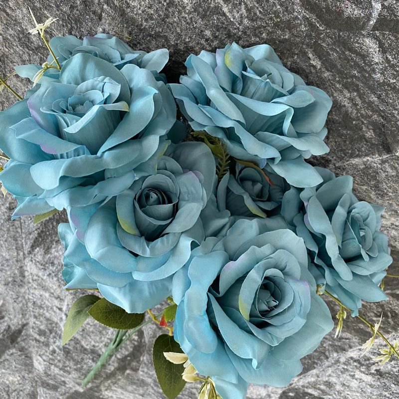 Artificial floral arrangements are Floribunda Roses, made of 240 woolen cloth, and available in 25 colors. Artificial rose flowers are used for wedding decoration and party decoration. Leafhometrade specializes in providing wholesale custom artificial flowers.