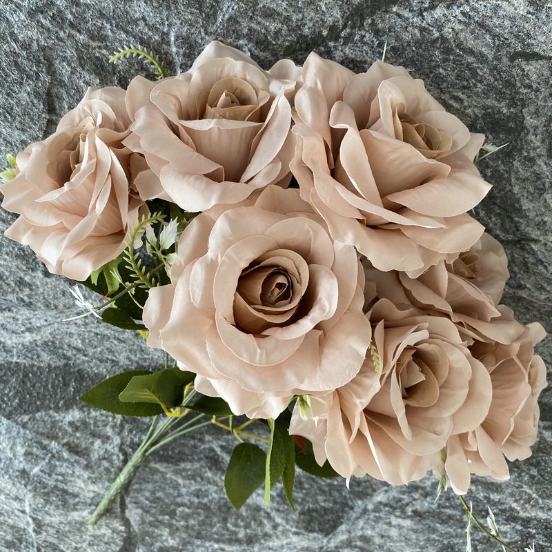 Artificial floral arrangements are Floribunda Roses, made of 240 woolen cloth, and available in 25 colors. Artificial rose flowers are used for wedding decoration and party decoration. Leafhometrade specializes in providing wholesale custom artificial flowers.