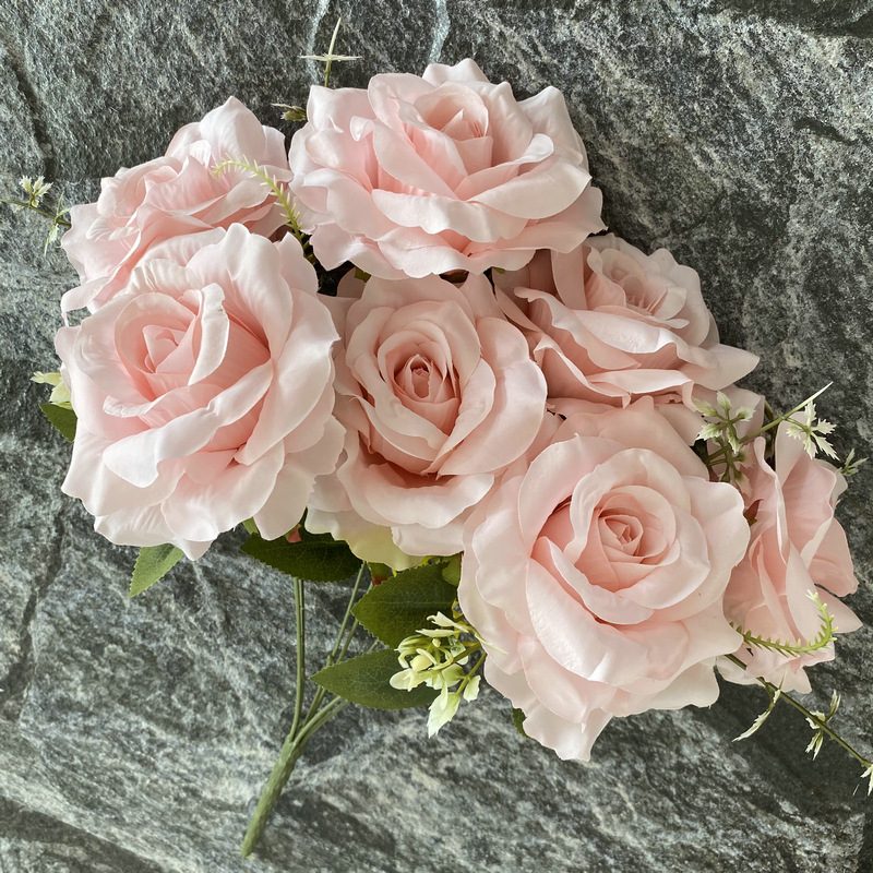 Artificial floral arrangements are Floribunda Roses, made of 240 woolen cloth, and available in 25 colors. Artificial rose flowers are used for wedding decoration and party decoration. Leafhometrade specializes in providing wholesale custom artificial flowers.