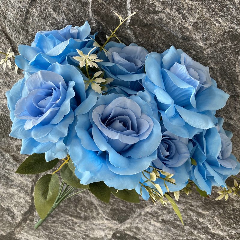 Artificial floral arrangements are Floribunda Roses, made of 240 woolen cloth, and available in 25 colors. Artificial rose flowers are used for wedding decoration and party decoration. Leafhometrade specializes in providing wholesale custom artificial flowers.