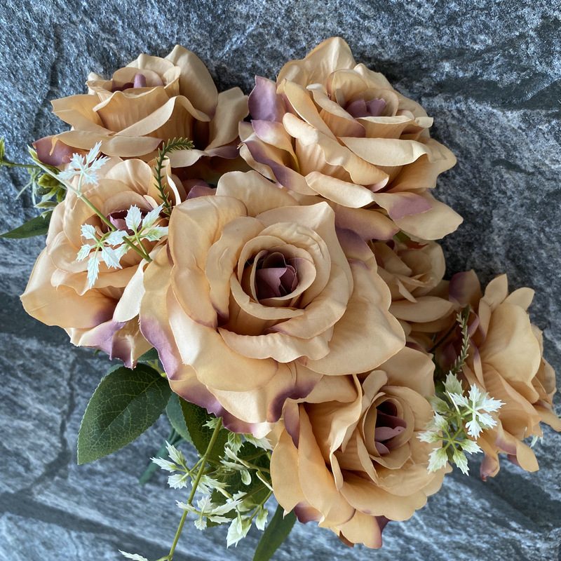 Artificial floral arrangements are Floribunda Roses, made of 240 woolen cloth, and available in 25 colors. Artificial rose flowers are used for wedding decoration and party decoration. Leafhometrade specializes in providing wholesale custom artificial flowers.