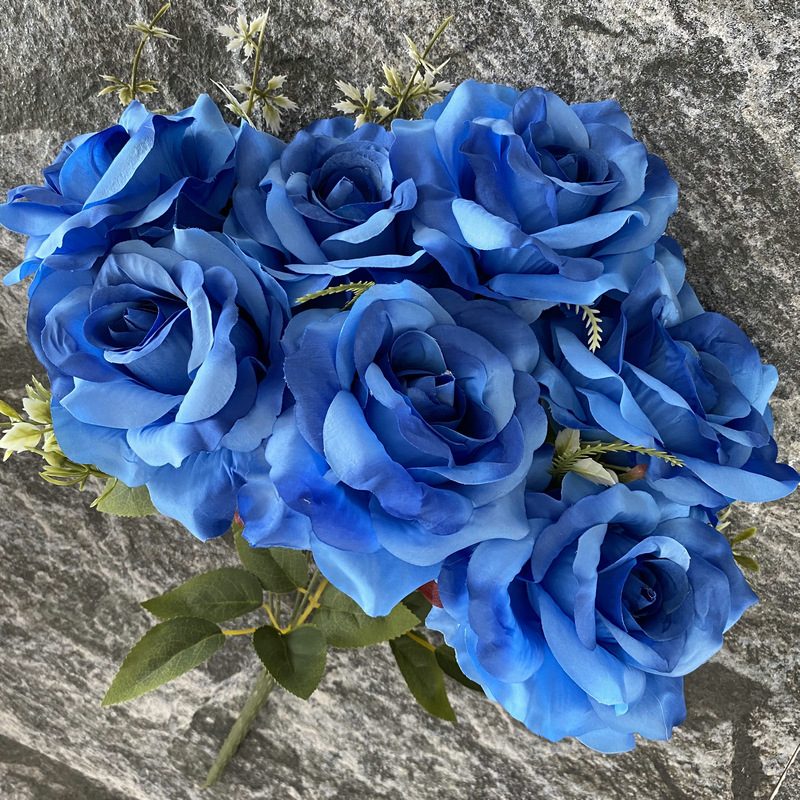 Artificial floral arrangements are Floribunda Roses, made of 240 woolen cloth, and available in 25 colors. Artificial rose flowers are used for wedding decoration and party decoration. Leafhometrade specializes in providing wholesale custom artificial flowers.