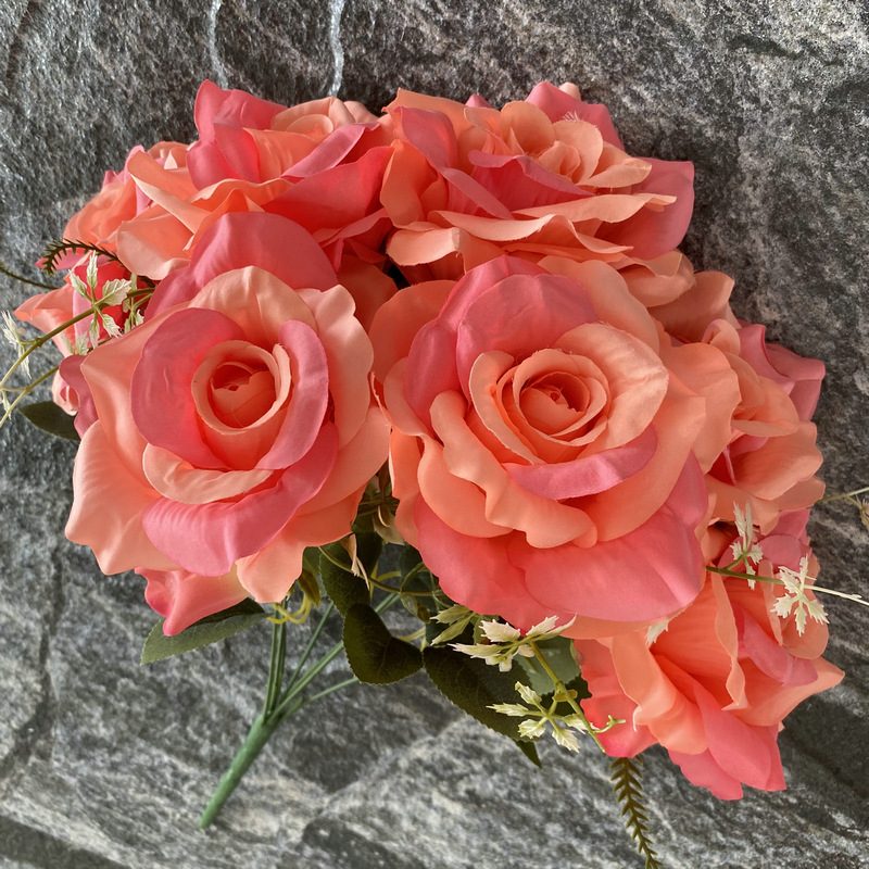 Artificial floral arrangements are Floribunda Roses, made of 240 woolen cloth, and available in 25 colors. Artificial rose flowers are used for wedding decoration and party decoration. Leafhometrade specializes in providing wholesale custom artificial flowers.