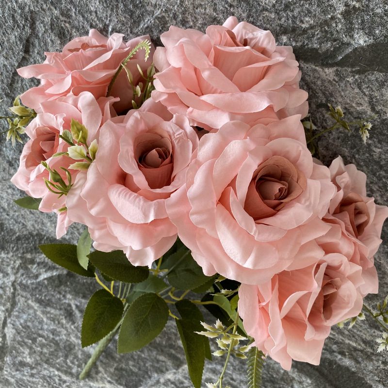 Artificial floral arrangements are Floribunda Roses, made of 240 woolen cloth, and available in 25 colors. Artificial rose flowers are used for wedding decoration and party decoration. Leafhometrade specializes in providing wholesale custom artificial flowers.