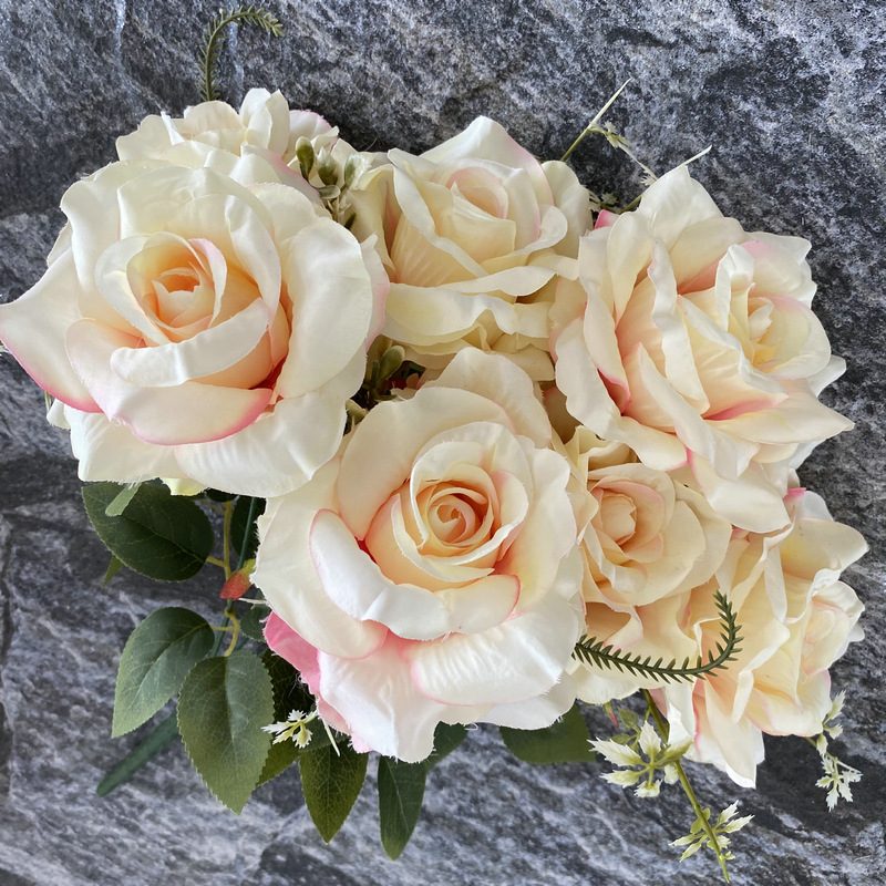 Artificial floral arrangements are Floribunda Roses, made of 240 woolen cloth, and available in 25 colors. Artificial rose flowers are used for wedding decoration and party decoration. Leafhometrade specializes in providing wholesale custom artificial flowers.