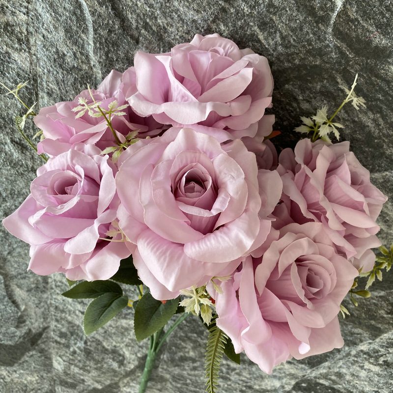 Artificial floral arrangements are Floribunda Roses, made of 240 woolen cloth, and available in 25 colors. Artificial rose flowers are used for wedding decoration and party decoration. Leafhometrade specializes in providing wholesale custom artificial flowers.