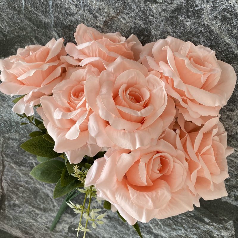 Artificial floral arrangements are Floribunda Roses, made of 240 woolen cloth, and available in 25 colors. Artificial rose flowers are used for wedding decoration and party decoration. Leafhometrade specializes in providing wholesale custom artificial flowers.