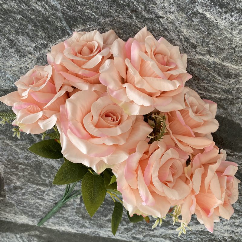 Artificial floral arrangements are Floribunda Roses, made of 240 woolen cloth, and available in 25 colors. Artificial rose flowers are used for wedding decoration and party decoration. Leafhometrade specializes in providing wholesale custom artificial flowers.