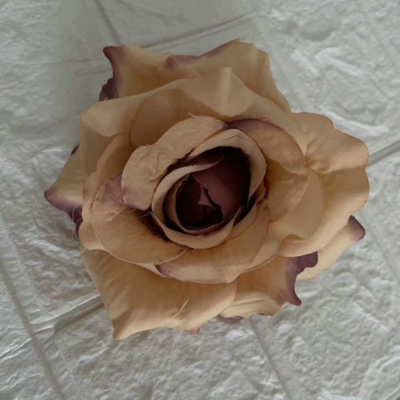 Faux Rose flowers head are Floribunda Rosess, made of silk cloth, available in 18 colors. Artificial rose flowers are used for home decoration and wedding flower decoration. Leafhometrade specializes in providing wholesale custom artificial plants.