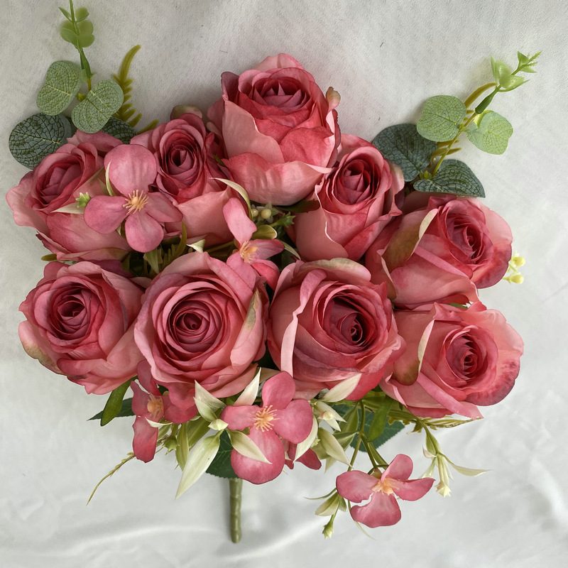 The decoration flowers are Floribunda Roses, made of Coated cloth, and available in 10 colors. Artificial rose flowers are used for wedding decoration and party decoration. Leafhometrade specializes in providing wholesale custom artificial flowers.