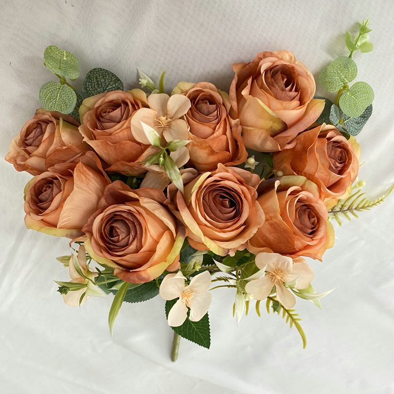 The decoration flowers are Floribunda Roses, made of Coated cloth, and available in 10 colors. Artificial rose flowers are used for wedding decoration and party decoration. Leafhometrade specializes in providing wholesale custom artificial flowers.