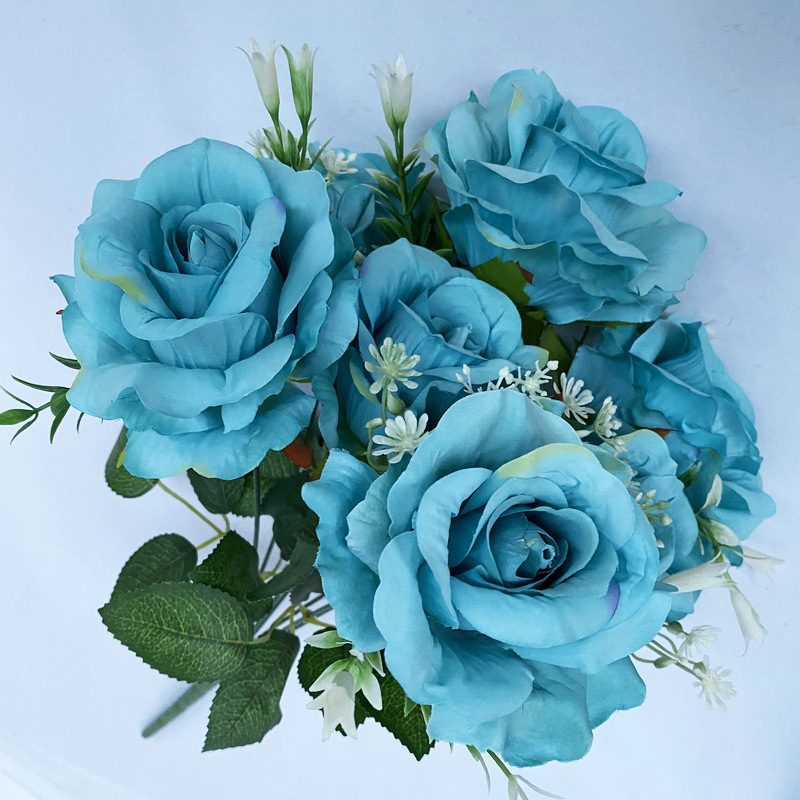 The artificial flowers are Floribunda Roses made from brushed fabric and are available in 16 colors. Artificial rose flowers are used for home decoration and wedding flower arrangements. Leafhometrade specializes in providing wholesale custom artificial plants.