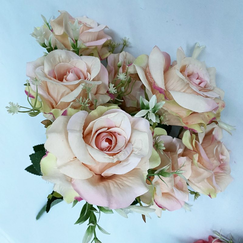 The artificial flowers are Floribunda Roses made from brushed fabric and are available in 16 colors. Artificial rose flowers are used for home decoration and wedding flower arrangements. Leafhometrade specializes in providing wholesale custom artificial plants.