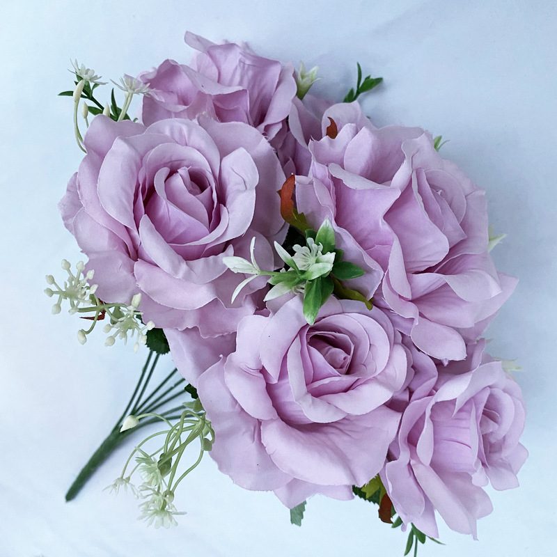 The artificial flowers are Floribunda Roses made from brushed fabric and are available in 16 colors. Artificial rose flowers are used for home decoration and wedding flower arrangements. Leafhometrade specializes in providing wholesale custom artificial plants.