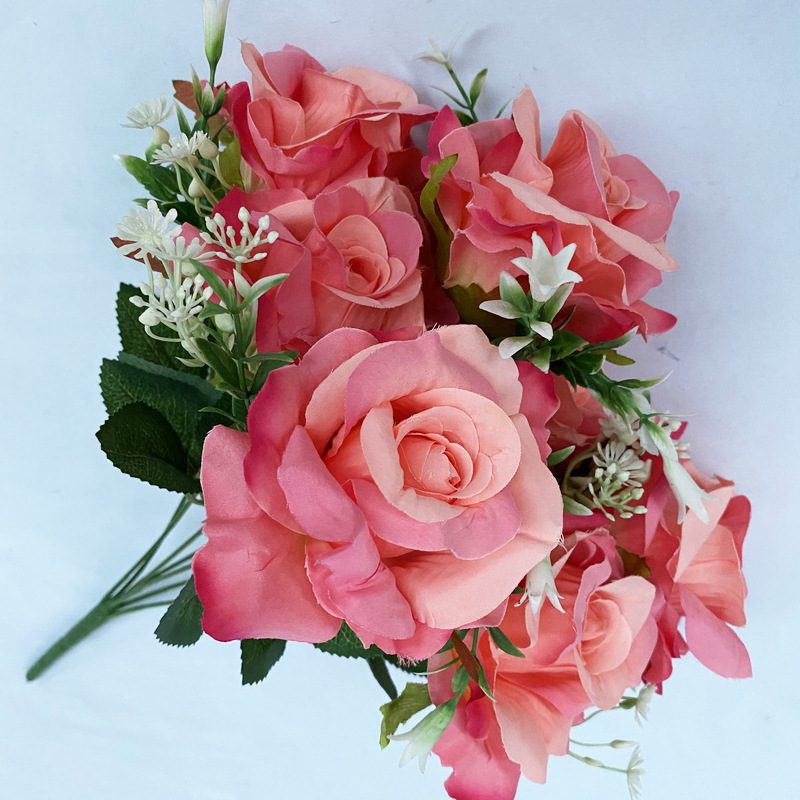 The artificial flowers are Floribunda Roses made from brushed fabric and are available in 16 colors. Artificial rose flowers are used for home decoration and wedding flower arrangements. Leafhometrade specializes in providing wholesale custom artificial plants.