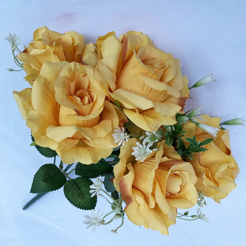 The artificial flowers are Floribunda Roses made from brushed fabric and are available in 16 colors. Artificial rose flowers are used for home decoration and wedding flower arrangements. Leafhometrade specializes in providing wholesale custom artificial plants.