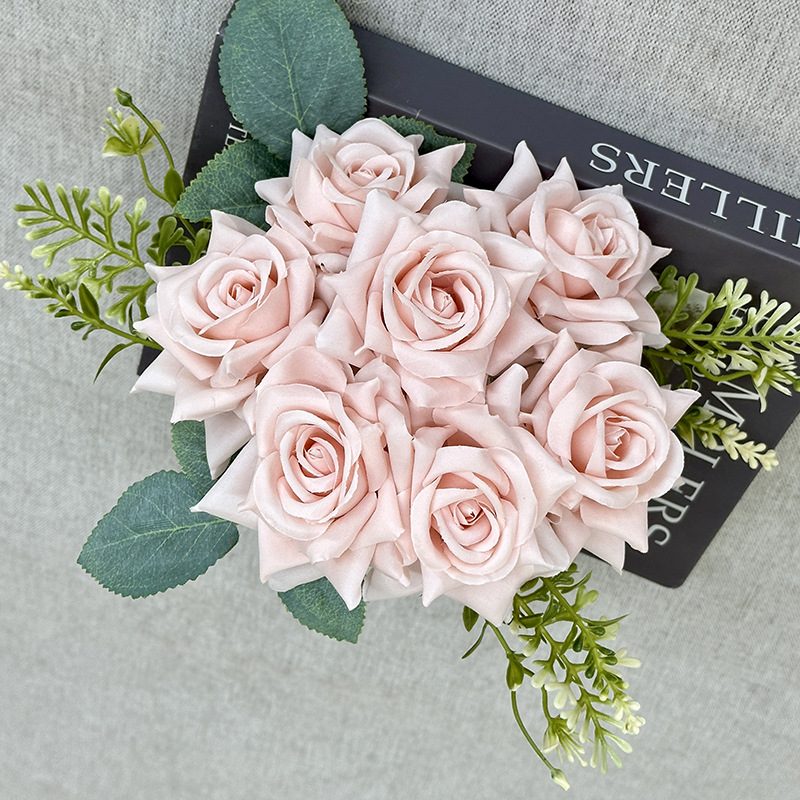 The rose bouquets are garden roses, made of coiled fabric, available in 10 colors. Artificial rose flowers are used for home decoration and wedding flower decoration. Leafhometrade specializes in providing wholesale custom artificial plants.