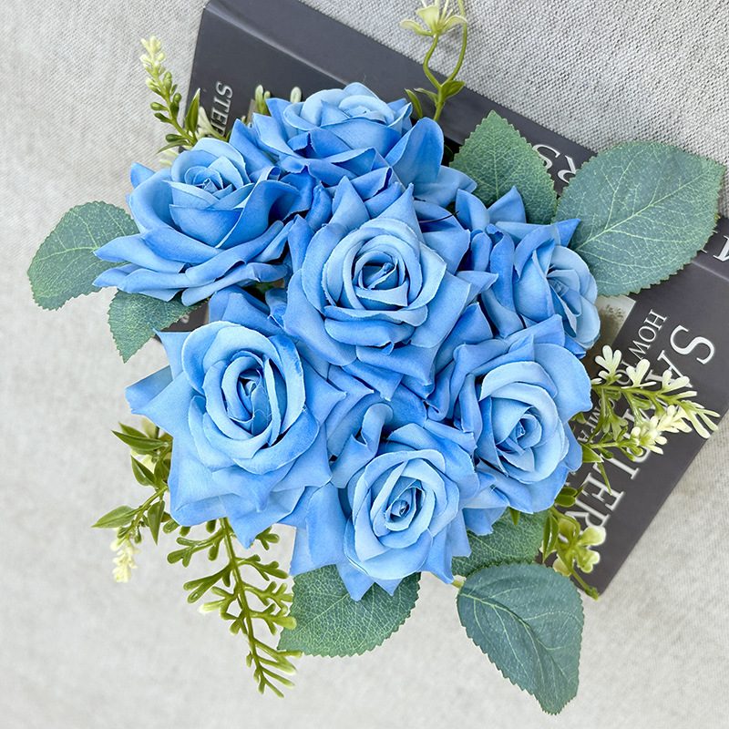 The rose bouquets are garden roses, made of coiled fabric, available in 10 colors. Artificial rose flowers are used for home decoration and wedding flower decoration. Leafhometrade specializes in providing wholesale custom artificial plants.