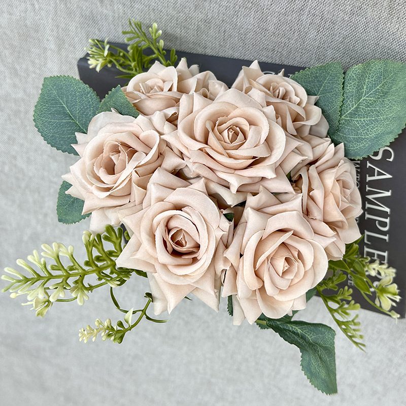 The rose bouquets are garden roses, made of coiled fabric, available in 10 colors. Artificial rose flowers are used for home decoration and wedding flower decoration. Leafhometrade specializes in providing wholesale custom artificial plants.