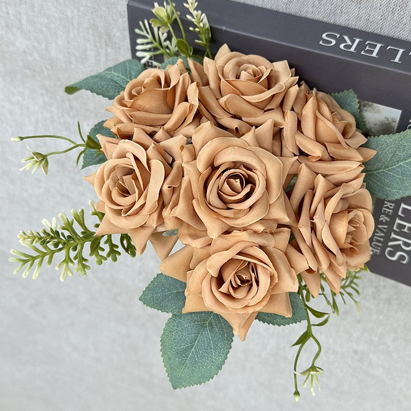 The rose bouquets are garden roses, made of coiled fabric, available in 10 colors. Artificial rose flowers are used for home decoration and wedding flower decoration. Leafhometrade specializes in providing wholesale custom artificial plants.