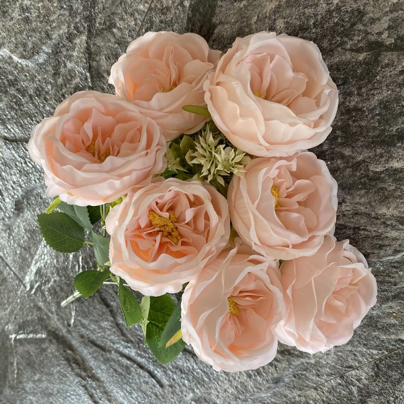 The artificial flowers are Garden Rose, made of fabric cloth, and available in 15 colors. Artificial rose flowers are used for wedding decoration and party decoration. Leafhometrade specializes in providing wholesale custom artificial flowers.