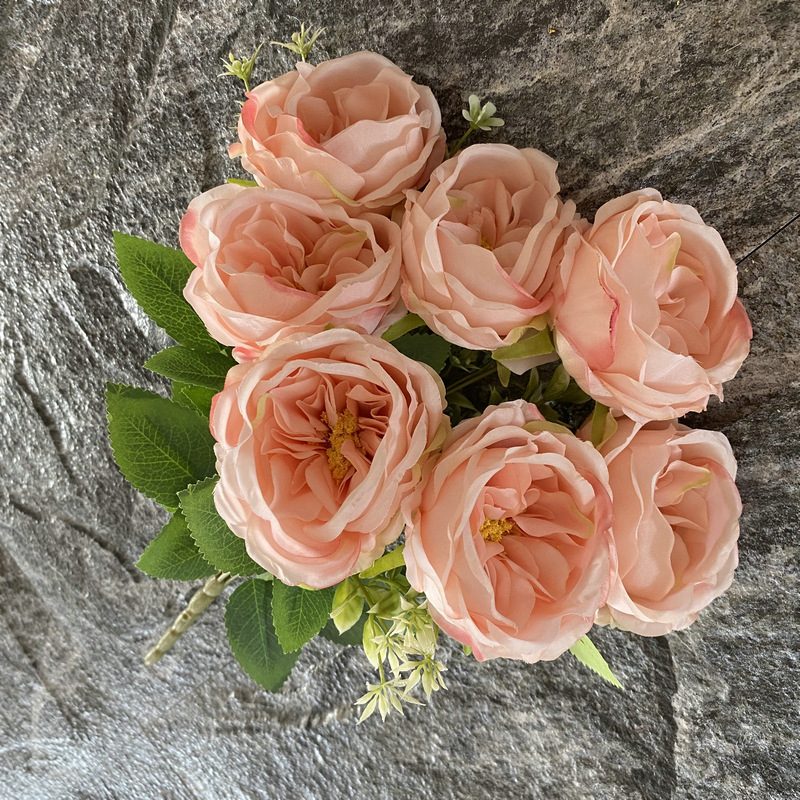 The artificial flowers are Garden Rose, made of fabric cloth, and available in 15 colors. Artificial rose flowers are used for wedding decoration and party decoration. Leafhometrade specializes in providing wholesale custom artificial flowers.