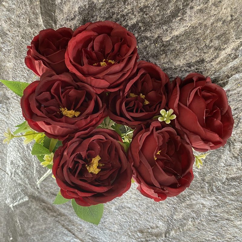 The artificial flowers are Garden Rose, made of fabric cloth, and available in 15 colors. Artificial rose flowers are used for wedding decoration and party decoration. Leafhometrade specializes in providing wholesale custom artificial flowers.