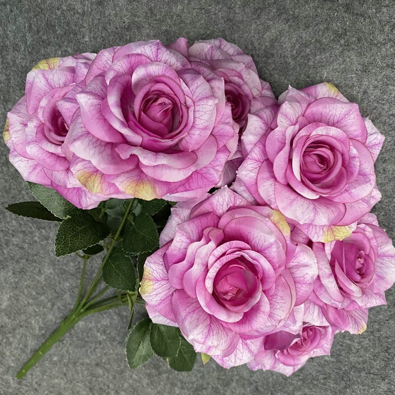 Artificial Rose Bouquet are garden roses made of printed laminated cloth with 12 colors available. Artificial Rose Flowers are used for Home Decor and Wedding Stage Decoration. Leafhometrade specializes in providing wholesale customized artificial plants.