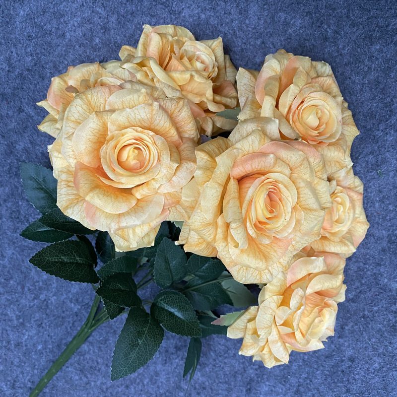 Artificial Rose Bouquet are garden roses made of printed laminated cloth with 12 colors available. Artificial Rose Flowers are used for Home Decor and Wedding Stage Decoration. Leafhometrade specializes in providing wholesale customized artificial plants.