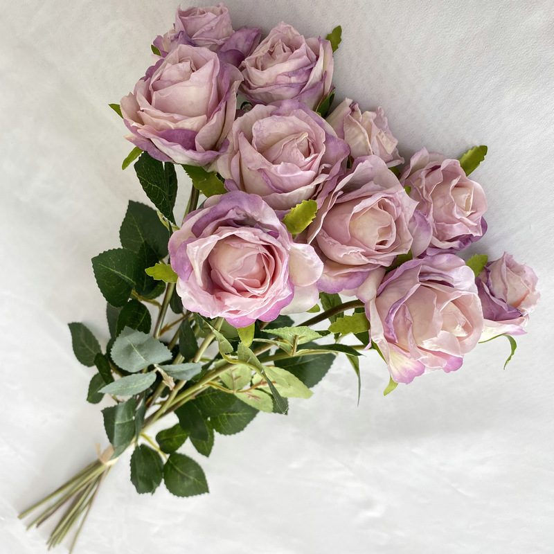 Decorative flowers artificial flowers are Garden Rose made of fabric cloth, available in 8 colors. Artificial rose flowers are used for home decoration and event decorations. Leafhometrade specializes in providing wholesale custom artificial flower arrangements.