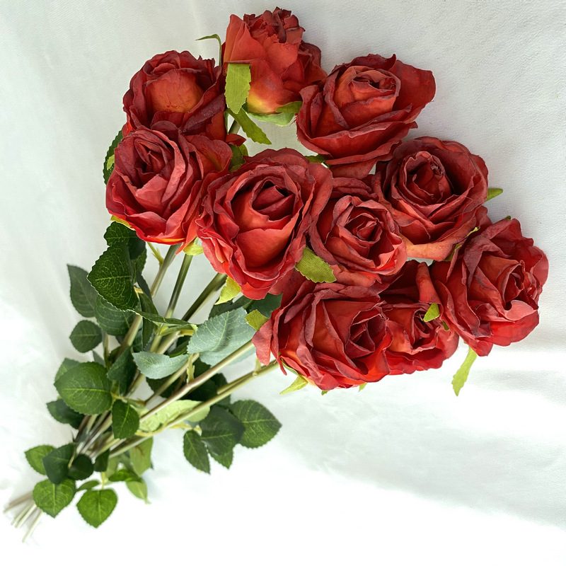 Decorative flowers artificial flowers are Garden Rose made of fabric cloth, available in 8 colors. Artificial rose flowers are used for home decoration and event decorations. Leafhometrade specializes in providing wholesale custom artificial flower arrangements.